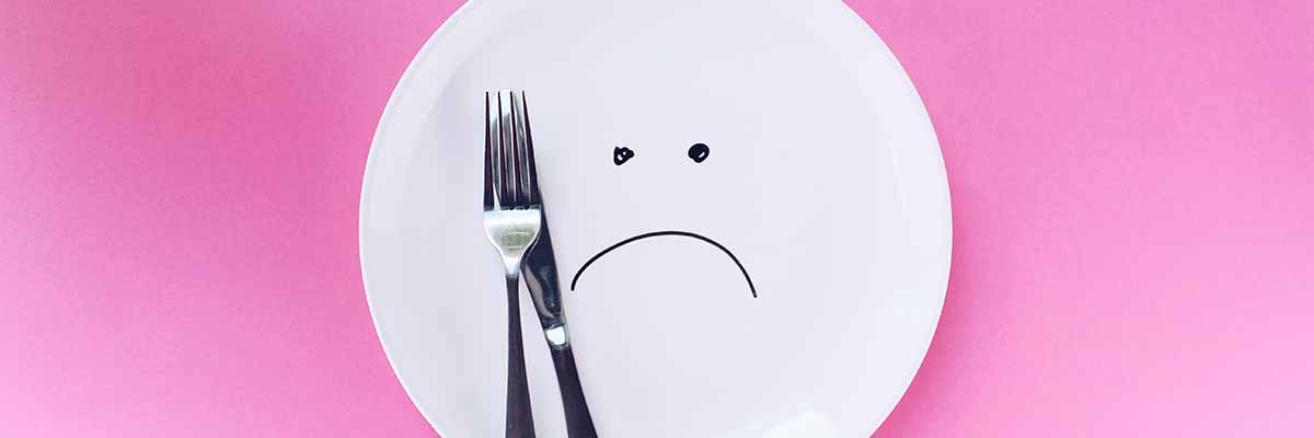 empty plate with frowny face