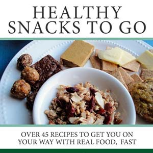 book cover with a plate of cheeses and baked goods with bowl of granola on top