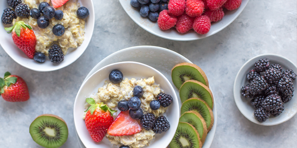 Bowl of oatmeal with blueberries, strawberries and blackberries