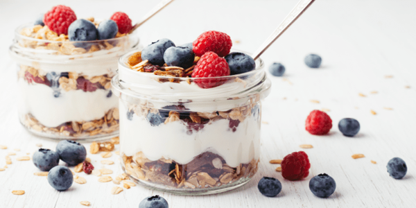 Cup of yogurt with fruit and granola
